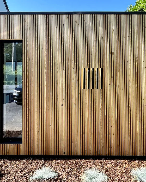 bardage en bois extérieur d'une extension de maison à Liège